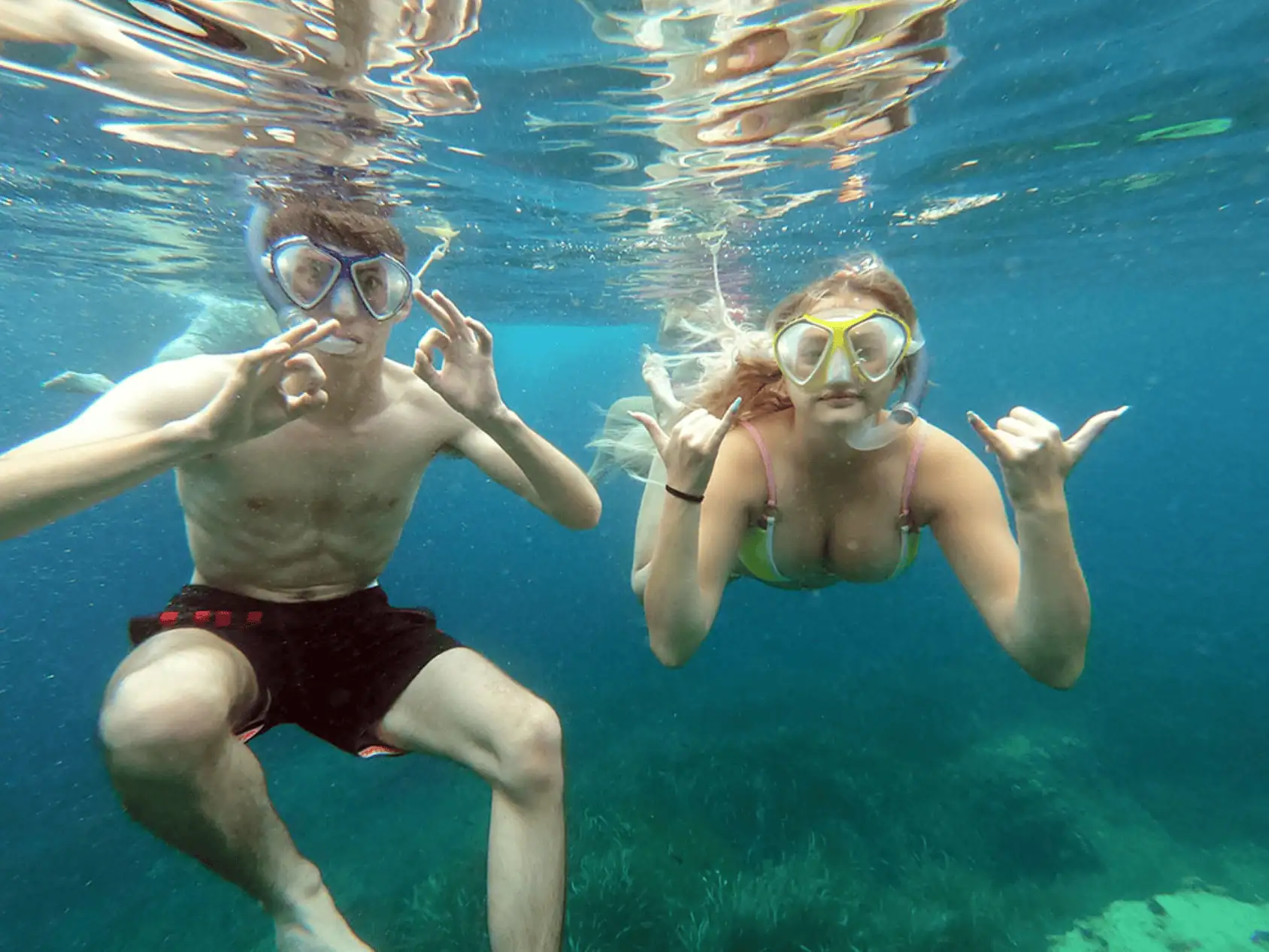 Snorkel en pareja aguas cristalinas